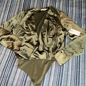 Good American green bodysuit